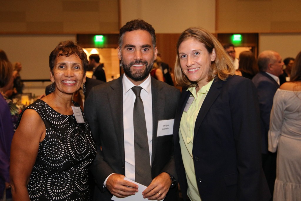 From left: Lorraine Haricombe, Univision news anchor Enrique Acevedo, and Benson Collection Director Melissa Guy. Photo: Daniel Hublein.