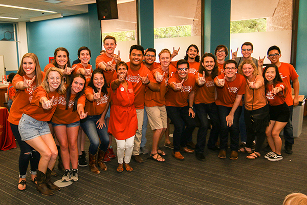 Lorraine Haricombe with the Longhorn Singers at the 2018 Libraries' tailgate.